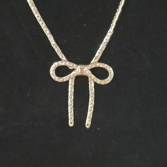 Avon Jewelry - Avon Gold-tone Bow Pendant Necklace
